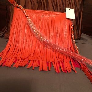 Medium crossbody fringe purse.